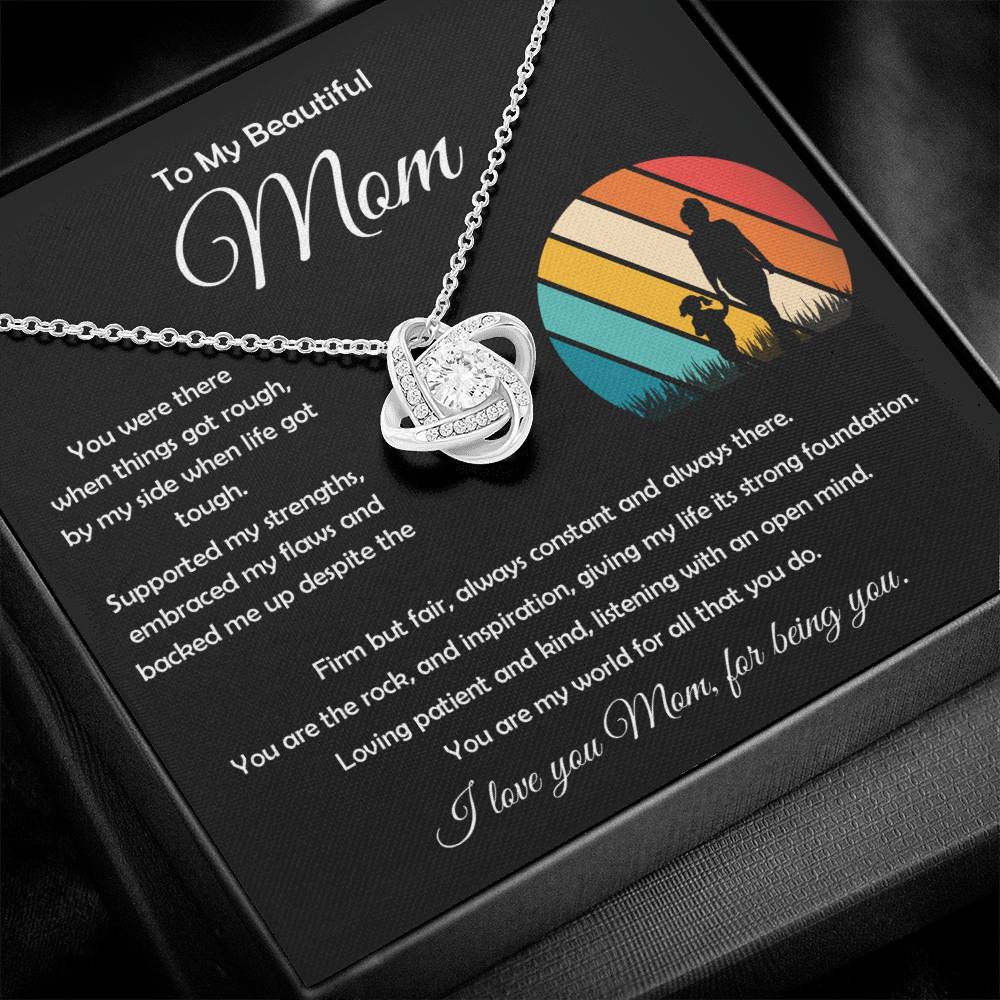 Love Knot Necklace displayed alongside heartfelt message card