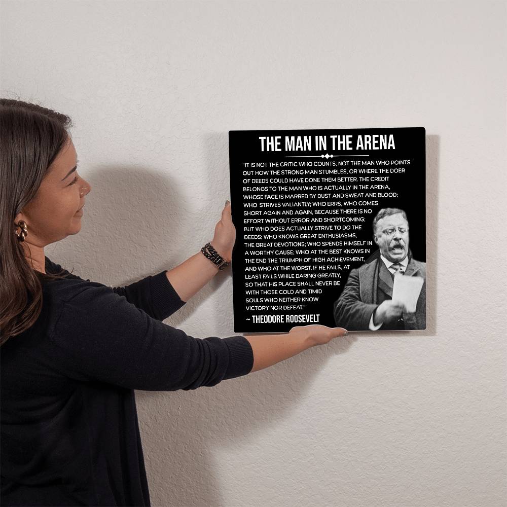 Detailed view of Teddy Roosevelt “Man in the Arena” engraved metal sign