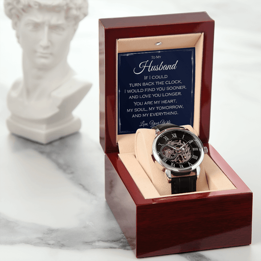 Husband anniversary luxury watch with elegant leather strap.