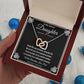 Gift box with interlocking hearts necklace and a loving message from Dad.