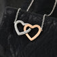 Intricate details of the cubic zirconia stones on the father-daughter heart necklace