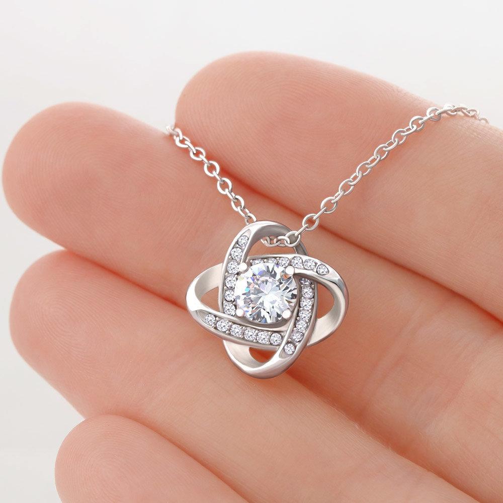 Close-up of the cubic zirconia stone in love knot necklace